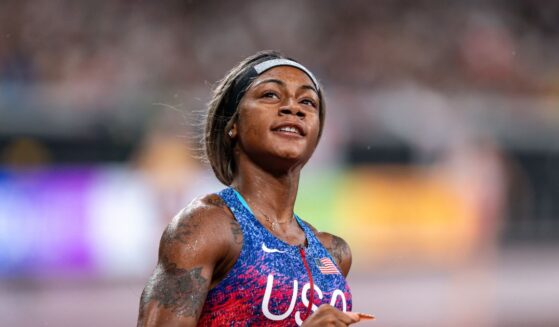 Sha'Carri Richardson of the United States celebrates at the finish line winning the gold medal during the 4x100 Metres Relay Women Final at day nine of the World Athletics Championships Tokyo 2025 at National Stadium on Sept. 21, 2025, in Tokyo, Japan.