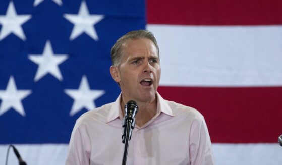 Conservative commentator Scott Jennings speaks at the Ashley's BBQ Bash fundraiser hosted by Rep. Ashley Hinson on Aug. 23, 2025, in Cedar Rapids, Iowa.