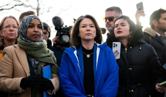 Rep. Ilhan Omar and Rep. Angie Craig arrive outside of the regional ICE headquarters at the Bishop Henry Whipple Federal Building on Jan. 10, 2026, in Minneapolis, Minnesota.