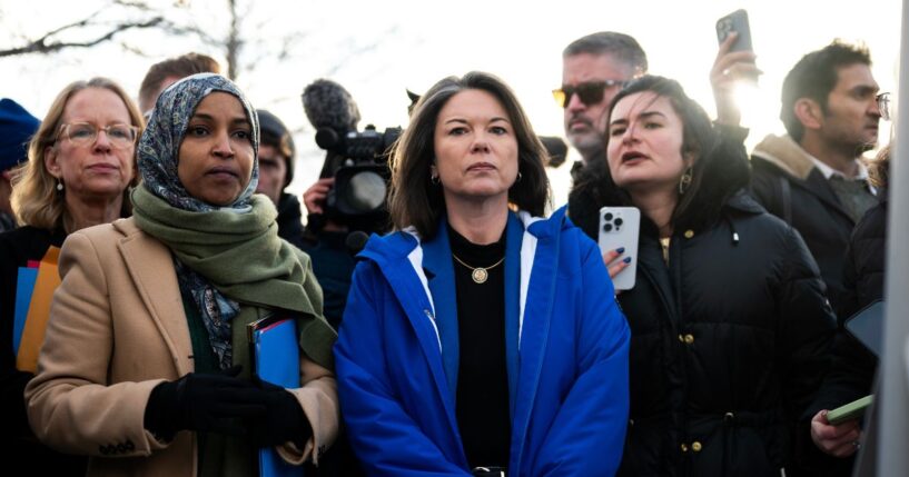 Rep. Ilhan Omar and Rep. Angie Craig arrive outside of the regional ICE headquarters at the Bishop Henry Whipple Federal Building on Jan. 10, 2026, in Minneapolis, Minnesota.