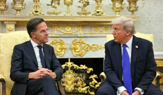 President Donald Trump talks to NATO Secretary General Mark Rutte during their meeting in the Oval Office of the White House in Washington, D.C., on Oct. 22, 2025.