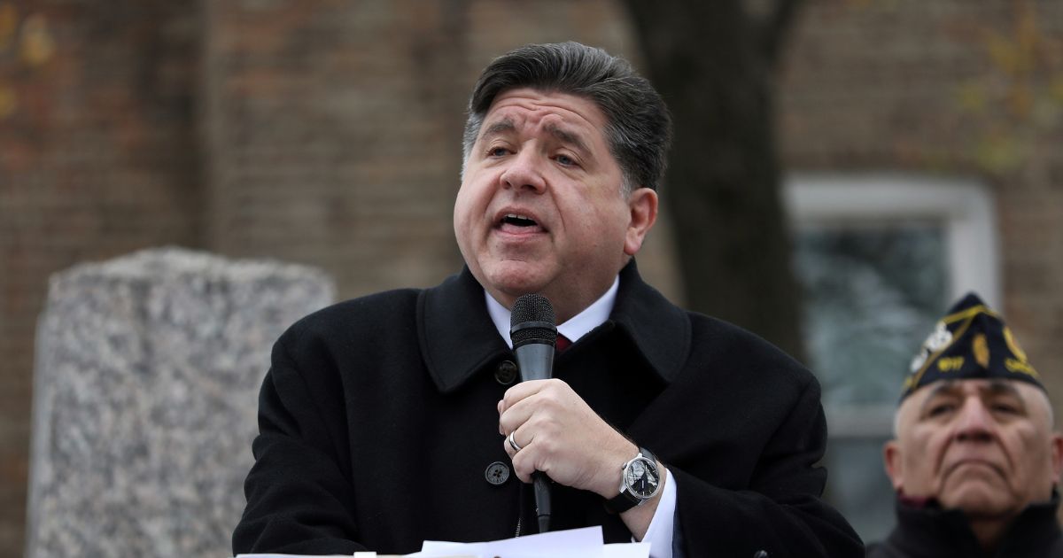 Illinois Gov. J.B. Pritzker delivers a short speech during a Veterans Day ceremony at Little Village's Manuel Perez Jr. Memorial Plaza on Nov. 11, 2025, in Chicago, Illinois.