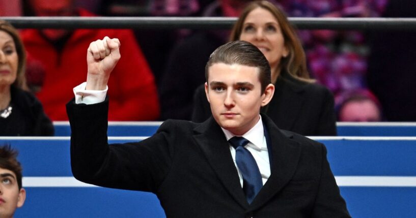 Barron Trump gestures after being acknowledged by his father, President Donald Trump, during the inaugural parade inside Capital One Arena, in Washington, D.C., on Jan. 20, 2025.