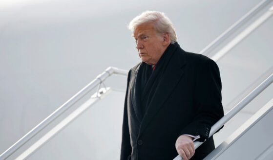 President Donald Trump disembarks Air Force One as he arrives at Zurich Airport before attending the World Economic Forum in Davos, on Jan. 21, 2026, in Zurich, Switzerland.