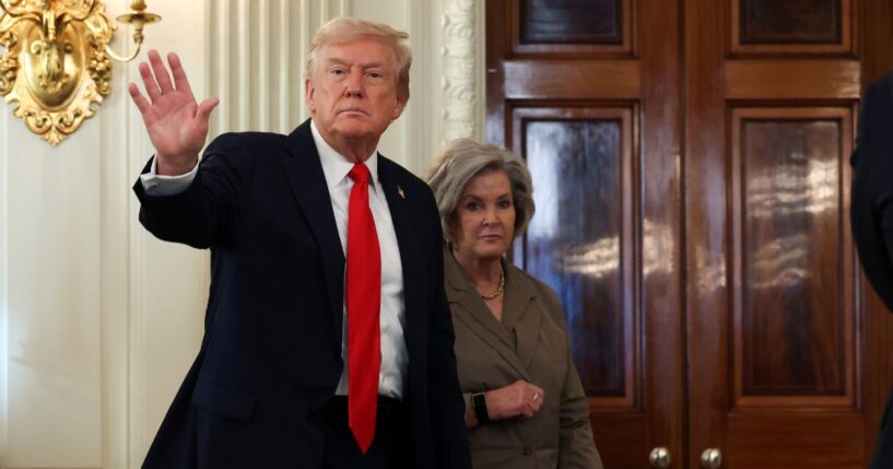 President Donald Trump departs with White House Chief of Staff Susie Wiles following a roundtable discussion in the State Dining Room of the White House on Oct. 8, 2025, in Washington, D.C.