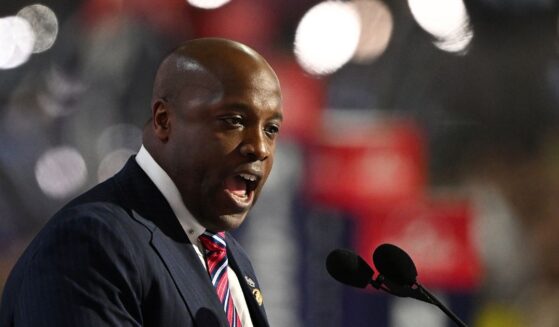 Rep Wesley Hunt, a Republican from Texas, speaks on stage during the first day of the Republican National Convention at the Fiserv Forum on July 15, 2024, in Milwaukee, Wisconsin.