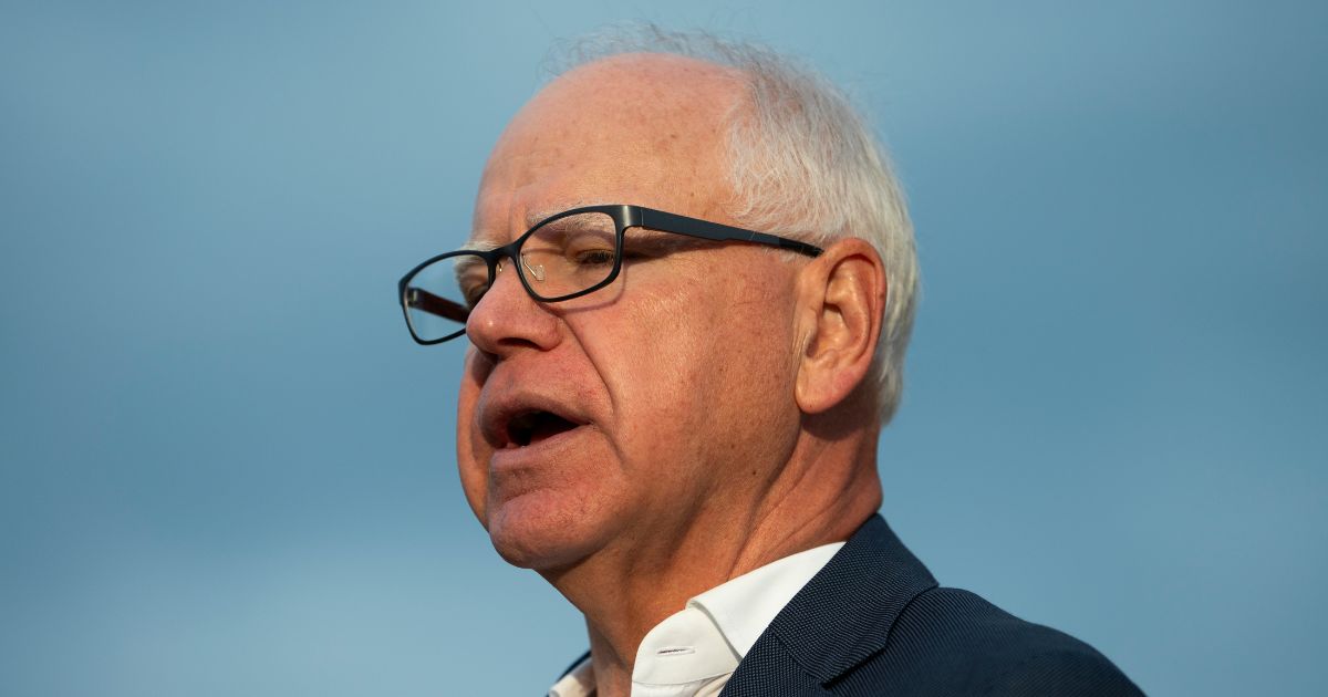 Minnesota Gov. Tim Walz speaks to media gathered on the first day of school at Deerwood Elementary on Sept. 2, 2025, in Eagan, Minnesota.
