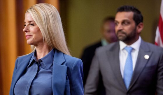 Attorney General Pam Bondi and FBI Director Kash Patel arrive for a news conference on an arrest of a suspect in the Jan. 6 pipe bombing case at the Department of Justice on Dec. 4, 2025, in Washington, D.C.