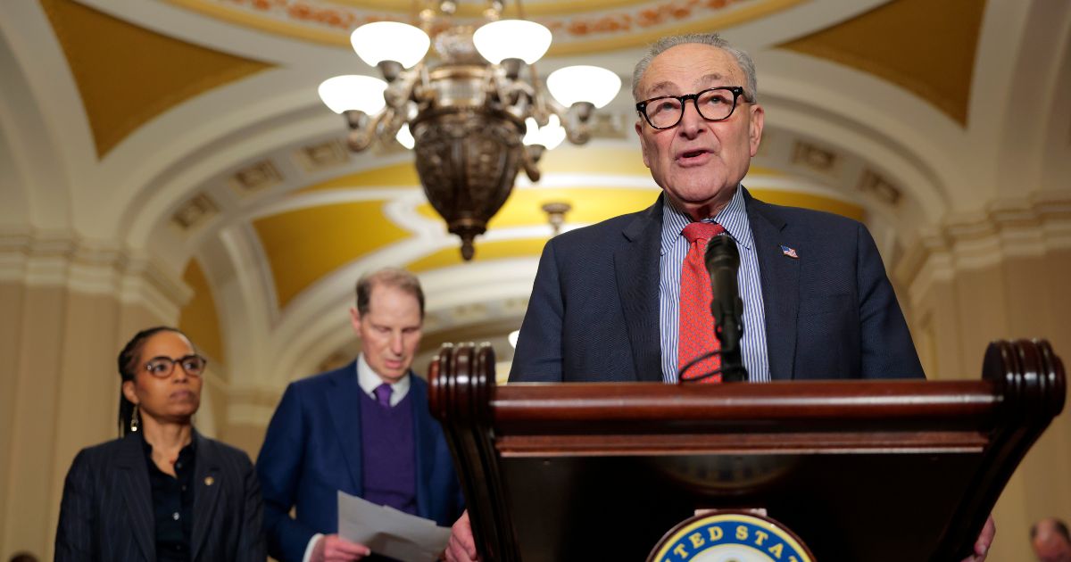 Senate Minority Leader Chuck Schumer, joined by Sen. Angela Alsobrooks and Sen. Ron Wyden, speaks to reporters following a Senate Democratic policy luncheon at the U.S. Capitol on Dec. 9, 2025, in Washington, D.C.