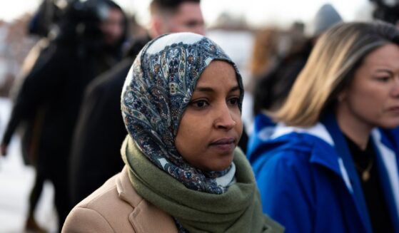Rep. Ilhan Omar and Rep. Angie Craig arrive outside of the regional ICE headquarters at the Bishop Henry Whipple Federal Building on Jan. 10, 2026, in Minneapolis, Minnesota.