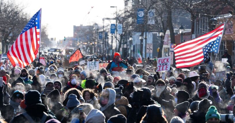 Protesters gather near where a man was shot dead by federal immigration agents in Minneapolis, Minnesota, on Jan. 24, 2026.