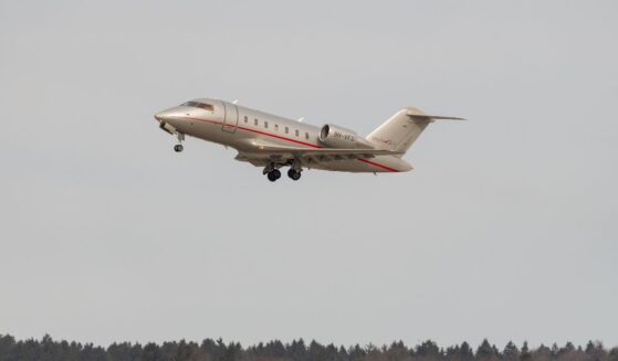 A Bombardier CL-600-2B16 Challenger is taking off from a runway on Feb. 24, 2022, in Zurich, Switzerland.