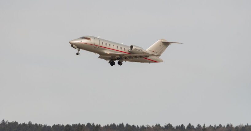 A Bombardier CL-600-2B16 Challenger is taking off from a runway on Feb. 24, 2022, in Zurich, Switzerland.