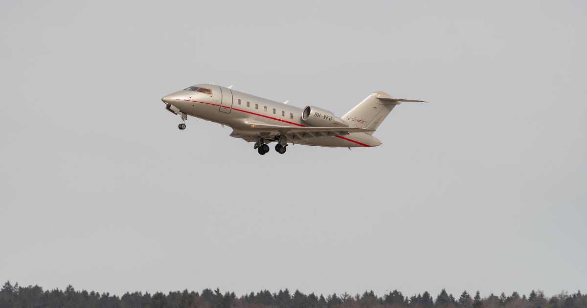 A Bombardier CL-600-2B16 Challenger is taking off from a runway on Feb. 24, 2022, in Zurich, Switzerland.