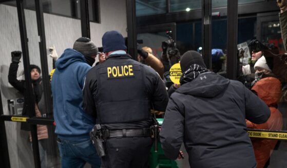 Rioters protest at a hotel on Jan. 25, 2026, in Minneapolis, Minnesota.