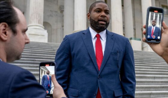Rep. Byron Donalds, a Florida Republican, speaks to reporters following a House vote in a November photo