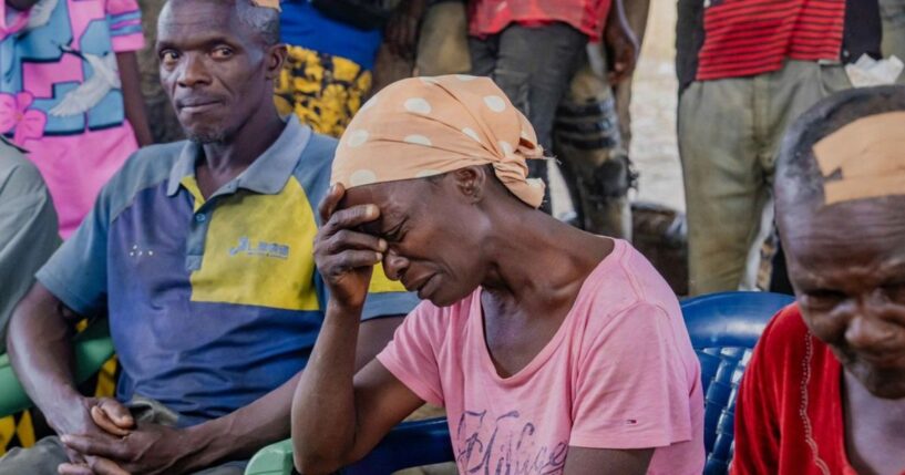 Survivors of Sunday's attack in Kurmin Wali, northwest Nigeria, react during a meeting with Kaduna state Governor Uba Sani Wednesday.