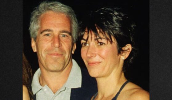 Jeffrey Epstein, and British socialite (and future convicted co-conspirator) Ghislaine Maxwell pose together in a file photo dated Feb. 12, 2000.