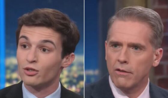 A smug young activist, Cameron Kasky, left, accused President Donald Trump of being part of a "human sex-trafficking network," and doubled down when conservative CNN panelist Scott Jennings, right, called him out. However, Kasky later apologized and retracted his statement, saying he "said that by accident and didn't mean it."