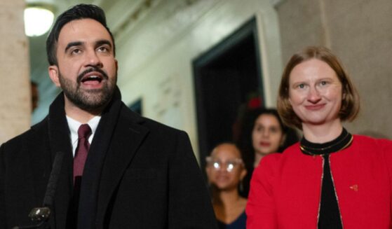 New York Mayor Zohran Mamdani, center, and Cea Weaver, right, the head of his new "Office to Protect Tenants," are seen at a New Year's Day news conference after Mamdani's swearing-in.