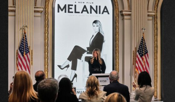 First lady Melania Trump delivers remarks promoting a new movie about her life in the New York Stock Exchange board room before ringing the opening bell, Wednesday.