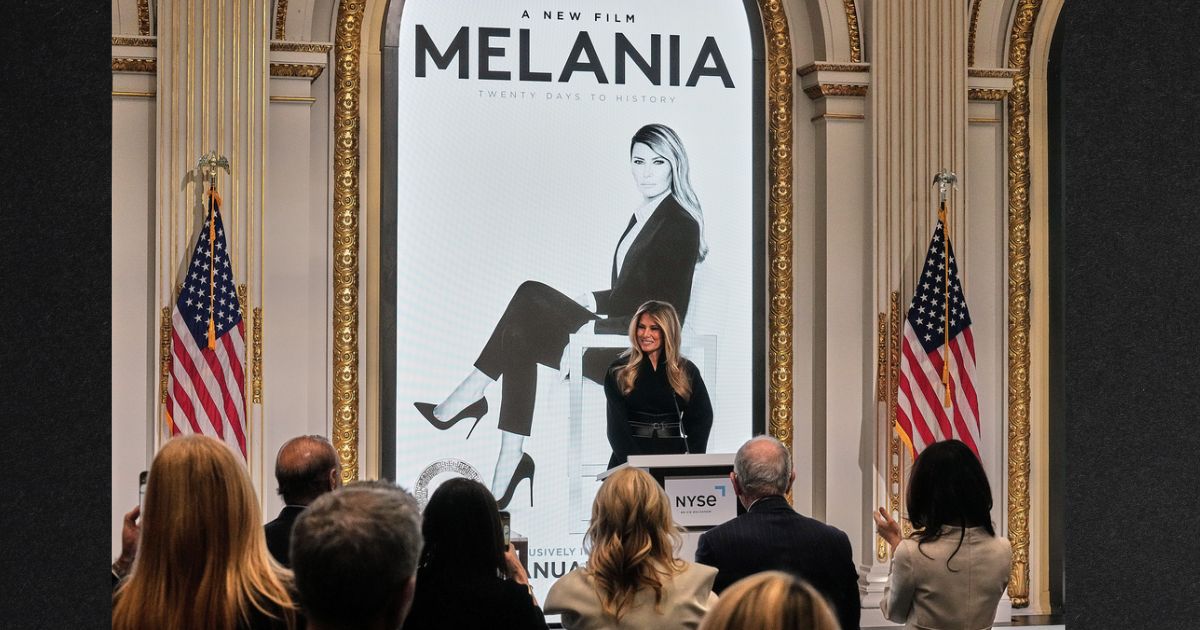 First lady Melania Trump delivers remarks promoting a new movie about her life in the New York Stock Exchange board room before ringing the opening bell, Wednesday.