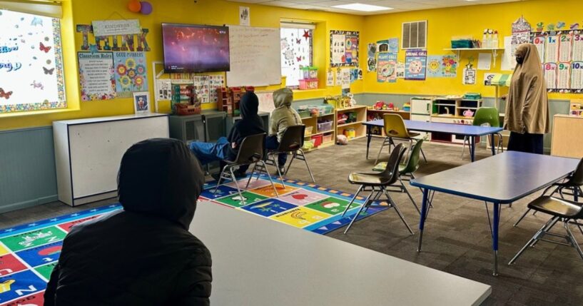 Children watch a television at the ABC Learning Center in Minneapolis, Minnesota, on Dec. 31, 2025.