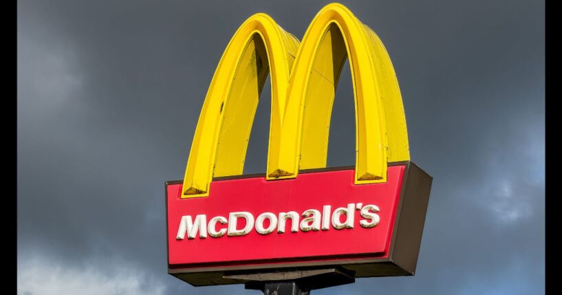 The sign for a McDonald's restaurant stands in front of a cloudy sky on Oct. 25, 2025.
