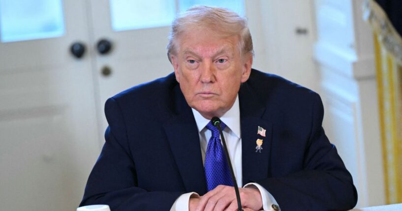 President Trump speaks during a meeting in the White House.