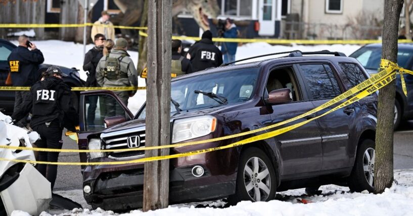 Members of law enforcement secure the scene of the shooting of Renee Good by an ICE agent after a tense exchange ending with her refusing to comply with lawful orders and pressing on the gas while he stood in front of the vehicle in Minneapolis, Minnesota, on Jan. 7, 2026.