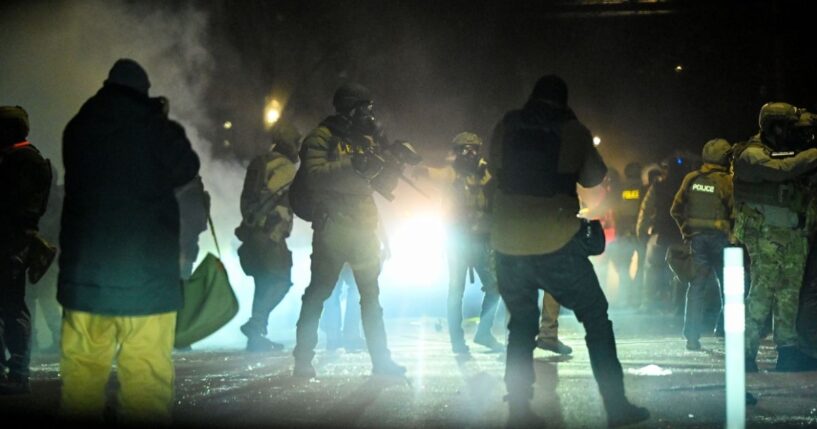Federal agents fire tear gas into a crowd of Minneapolis rioters amid unrest in Minneapolis, Minnesota, on Jan. 14, 2026.