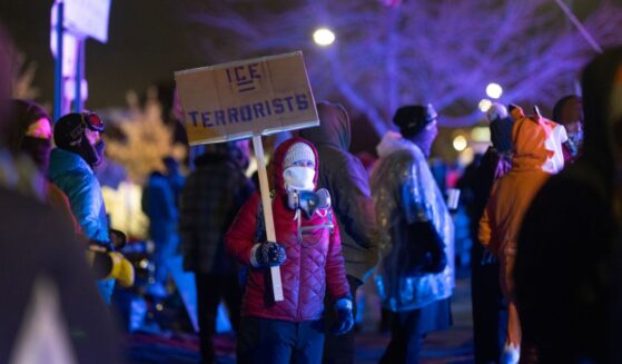 Anti-ICE protesters and agitators gather outside a federal building in Minneapolis, Minnesota, on Jan. 17, 2026.