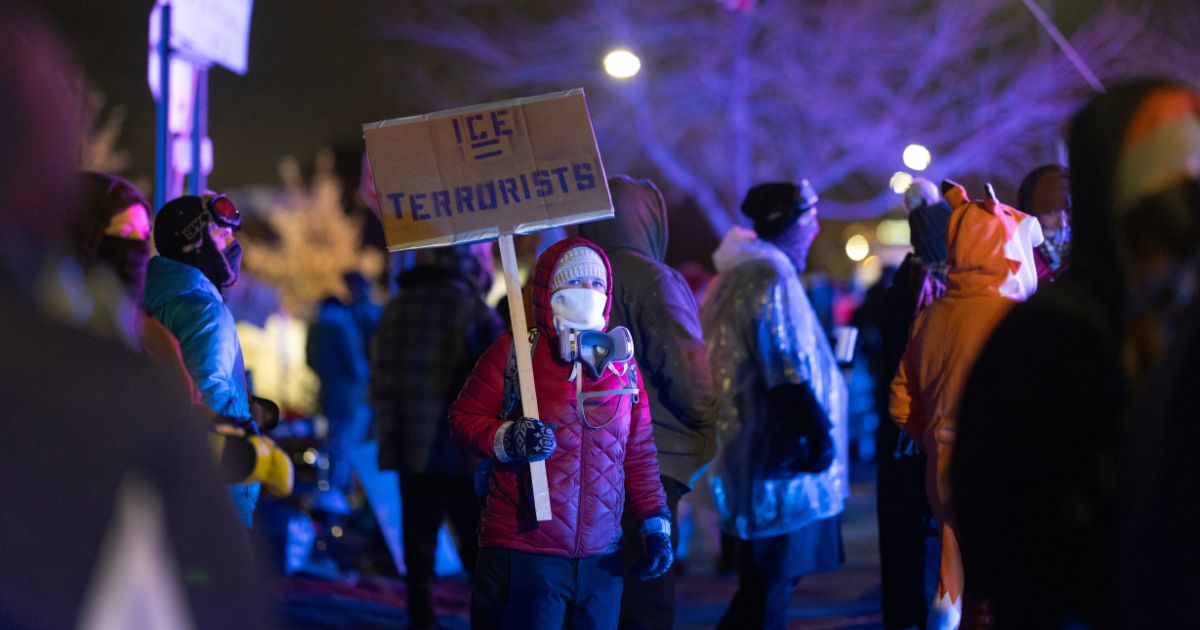 Anti-ICE protesters and agitators gather outside a federal building in Minneapolis, Minnesota, on Jan. 17, 2026.