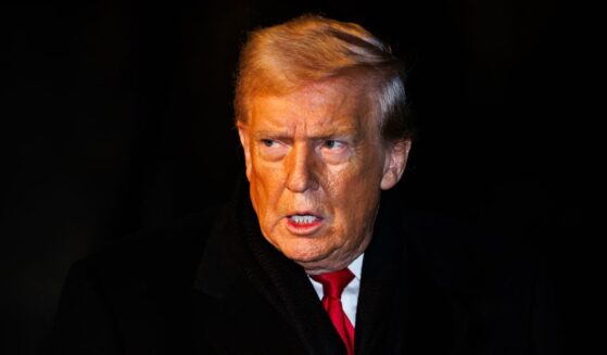 President Donald Trump walks over to reporters on the South Lawn of the White House in Marine One on Jan. 20, 2026 in Washington, DC.