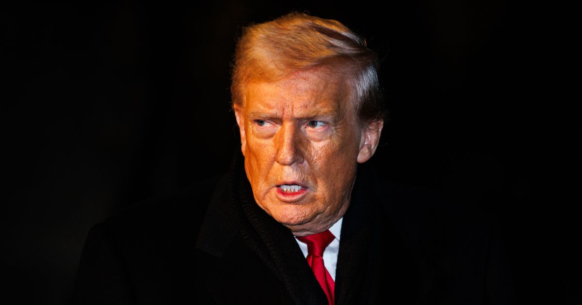 President Donald Trump walks over to reporters on the South Lawn of the White House in Marine One on Jan. 20, 2026 in Washington, DC.