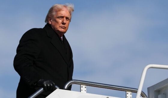 President Donald Trump boards Air Force One at Joint Base Andrews, Maryland, on Jan. 27, 2026.
