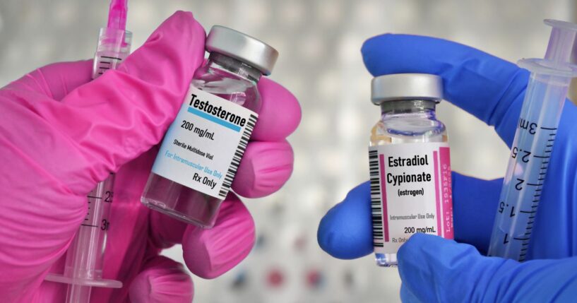 Vials of testosterone and estrogen for injection treatment.