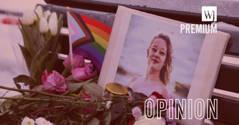 Flowers and candles are seen at a vigil for Renee Nicole Good in front of the United States embassy on Jan. 11, 2026, in Berlin, Germany.
