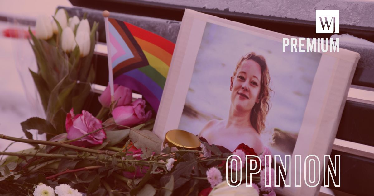 Flowers and candles are seen at a vigil for Renee Nicole Good in front of the United States embassy on Jan. 11, 2026, in Berlin, Germany.
