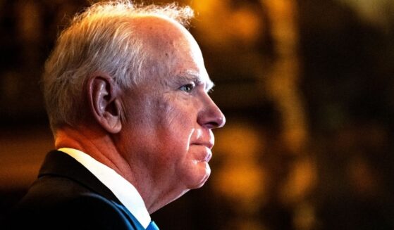 Minnesota Gov. Tim Walz is seen at a Jan. 5 news conference in St. Paul, Minnesota, where he announced that he was abandoning his re-election campaign. Now, Republicans in the state legislature are planning to impeach him.