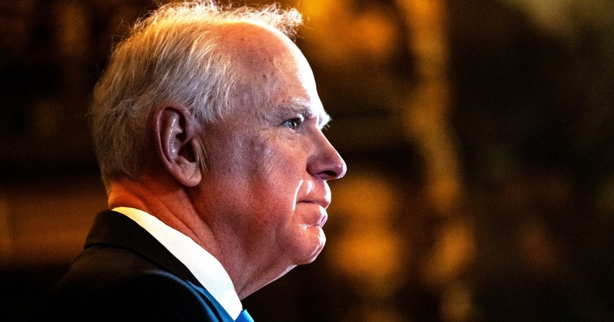 Minnesota Gov. Tim Walz is seen at a Jan. 5 news conference in St. Paul, Minnesota, where he announced that he was abandoning his re-election campaign. Now, Republicans in the state legislature are planning to impeach him.