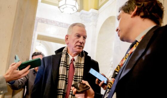 GOP Sen. Tommy Tuberville of Alabama, seen speaking to reporters Tuesday at the U.S. Capitol, was one of the Republicans who opposed advancing the funding package.