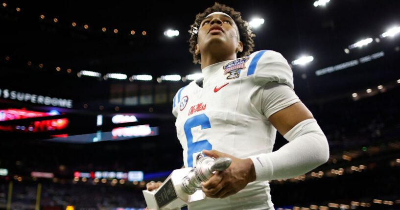 Trinidad Chambliss #6 of the Ole Miss Rebels holds the offensive player of the game trophy after defeating the Georgia Bulldogs during the 2025 College Football Playoff Quarterfinal at the Allstate Sugar Bowl at Caesars Superdome Thursday in New Orleans, Louisiana.