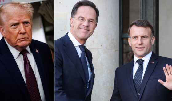 President Donald Trump shared text messages from NATO Secretary-General Mark Rutte and French President Emmanuel Macron, below right, as he prepared to leave for Davos, Switzerland, to meet with world leaders.