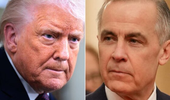 Canadian Prime Minister Mark Carney, right, said his country now has no plans to proceed with a trade deal with Beijing after President Donald Trump threatened harsh tariffs.