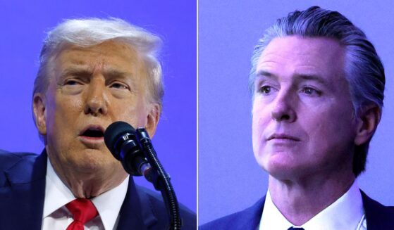 The brief encounter took place backstage while California Gov. Gavin Newsom, right, and President Donald Trump were attending the World Economic Forum's annual meeting this week in Davos, Switzerland.
