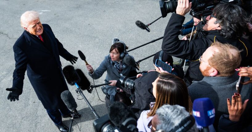 President Donald Trump speaks to the media on the South Lawn of the White House on Friday.