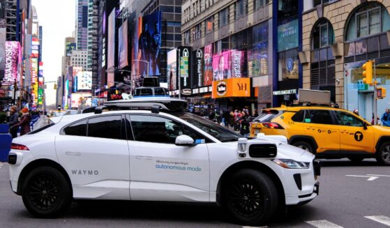 A Waymo autonomous self-driving Jaguar electric vehicle is seen in the Manhattan borough of New York City, on Dec.13. Waymo robotaxis are active in several large U.S. cities, sometimes presenting odd -- or dangerous -- challenges for police and those around them.