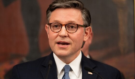 House Speaker Mike Johnson addresses the media Thursday after the House voted to pass its final slate of spending bills for the upcoming fiscal year.