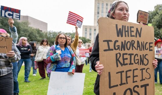 Women's March Network protesters against President Donald Trump are pictured during a Jan. 20 demonstration outside Houston City Hall in Houston, Texas.